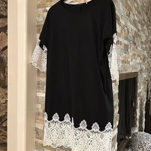 Black dress with white lace